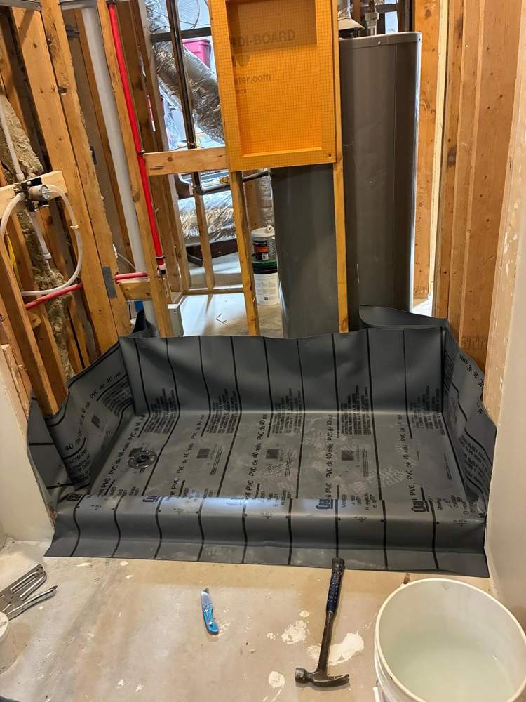 Shower remodel: Before: waterproof liner