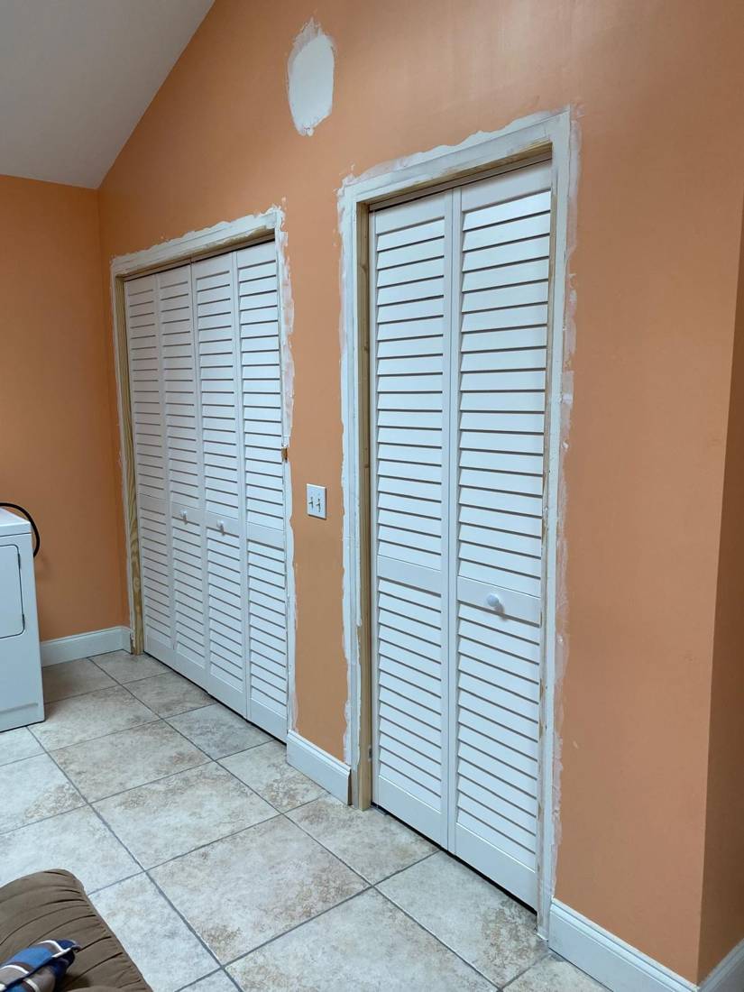 Laundry area: Before: trim and wall repair