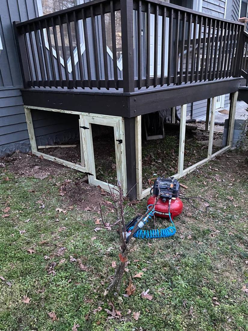 Storage under the deck: Framing and door installed