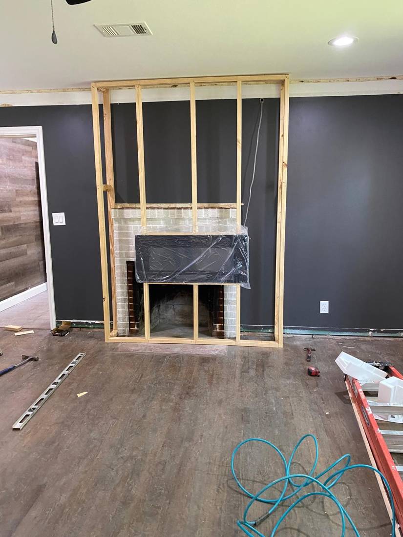 Fireplace TV wall: Before: framed wall