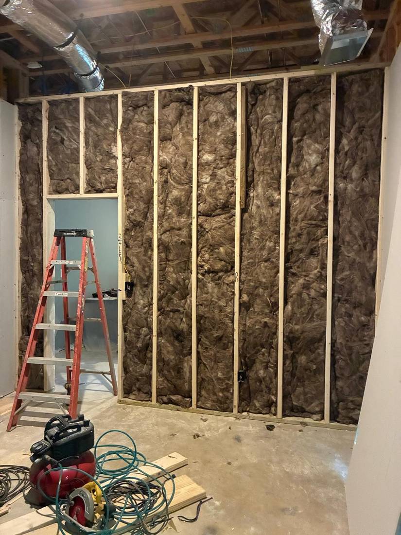 New interior wall: Before: framing and insulation