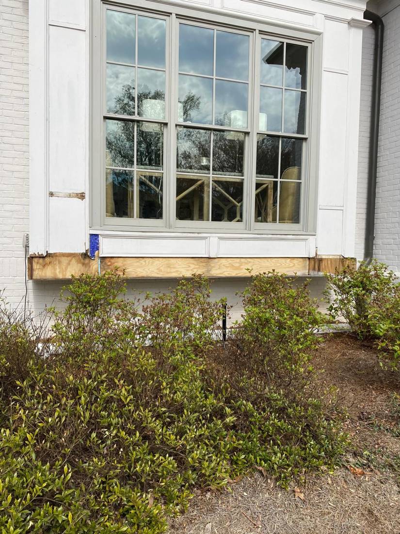 Window sill repair: Before: rotted sill removed
